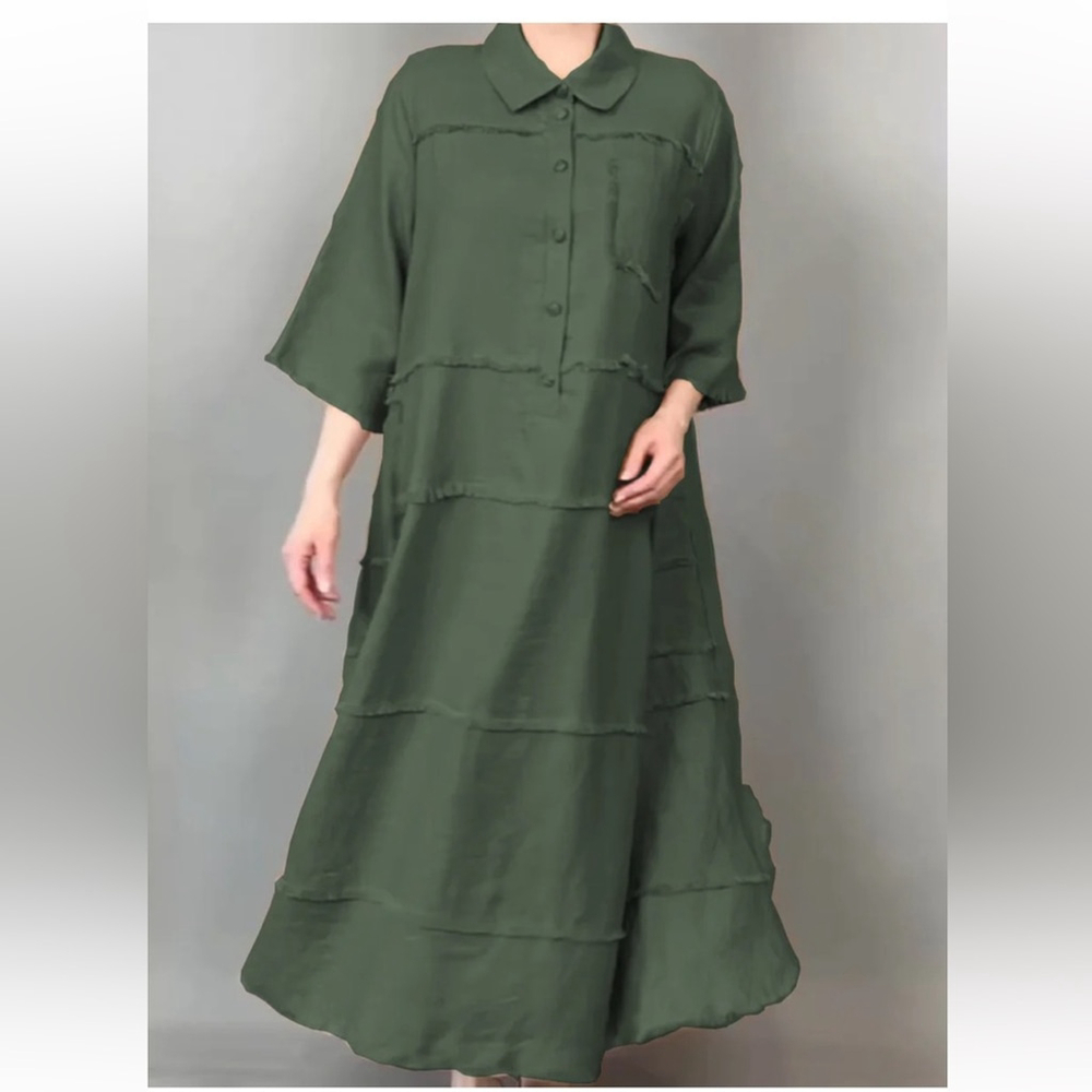 green loose-fitting, long-sleeved shirt dress button-up collar pockets.